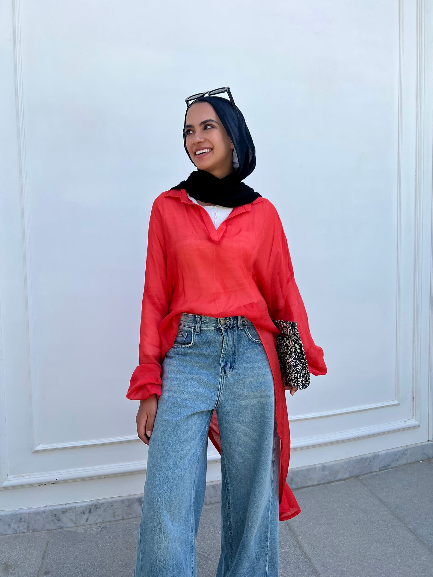 Red high low blouse.