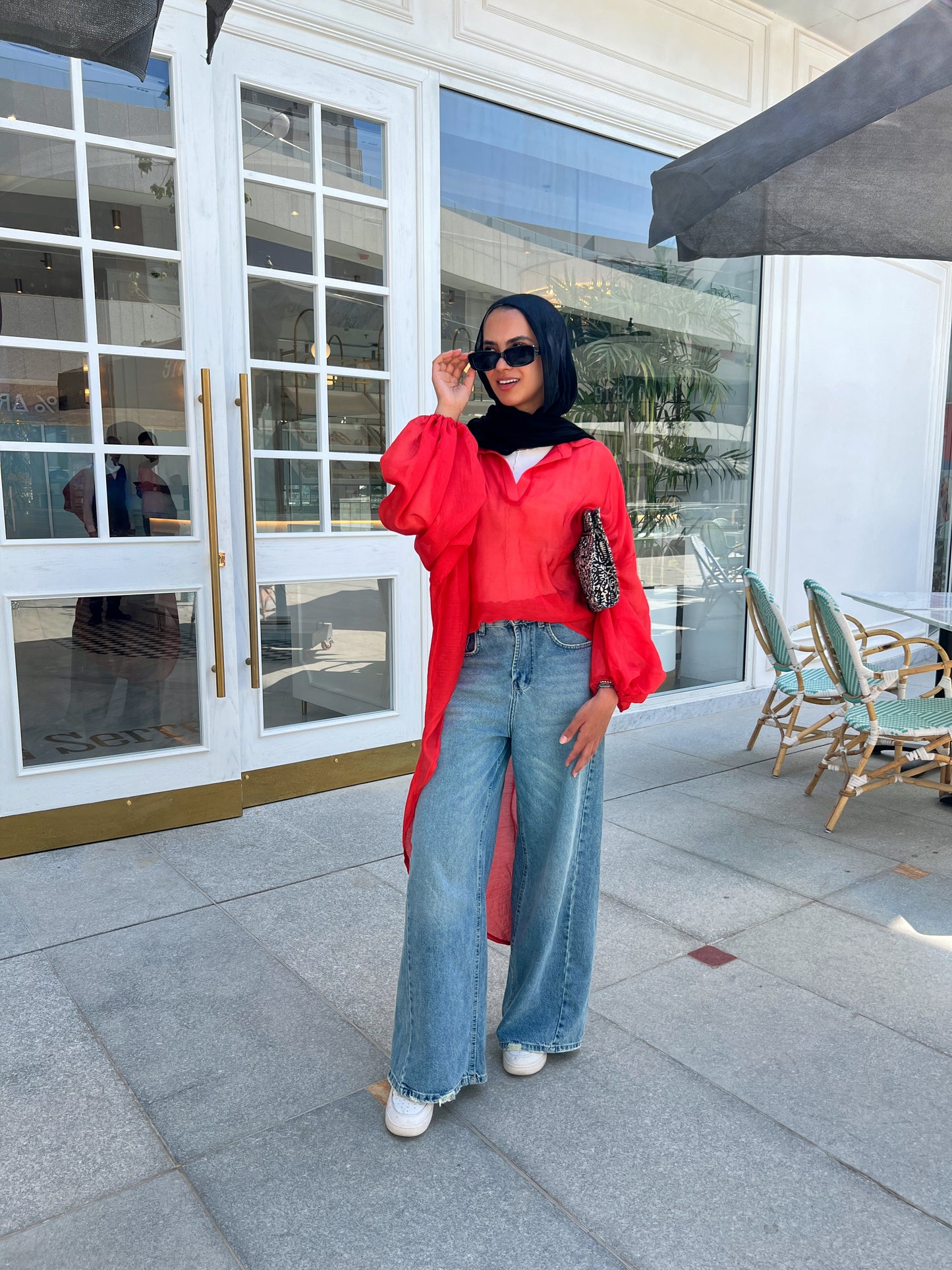 Red high low blouse.